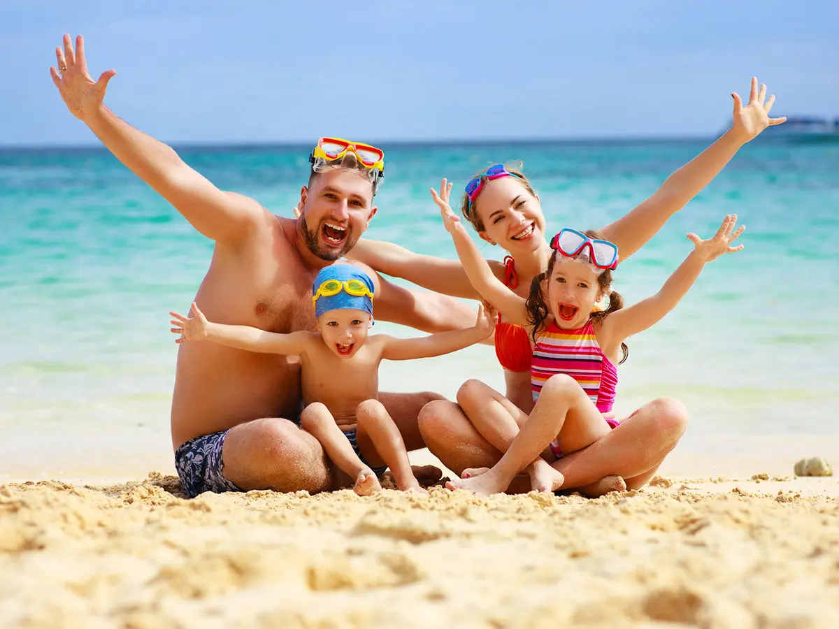 Family enjoying Playa Delfines in Cancun, a safe and kid-friendly beach